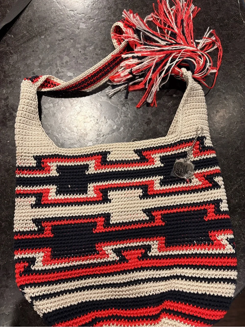 The Sak Crochet Hobo Bag in Red, Black & Cream with Tassel - Picture 1 of 4